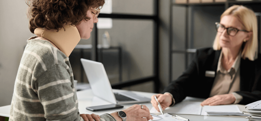 A lawyer discusses medical payments coverage with a client