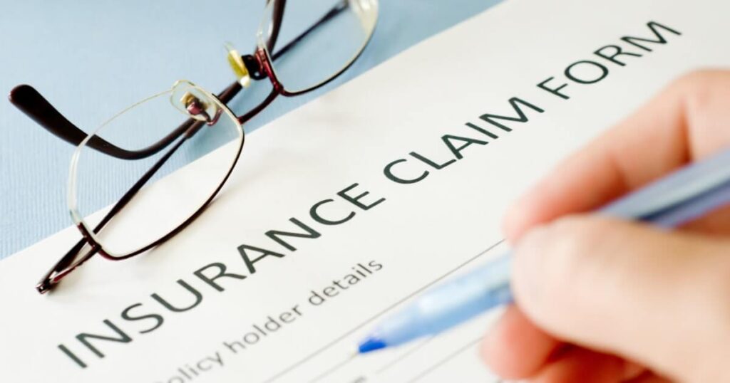 A close up an insurance claim form