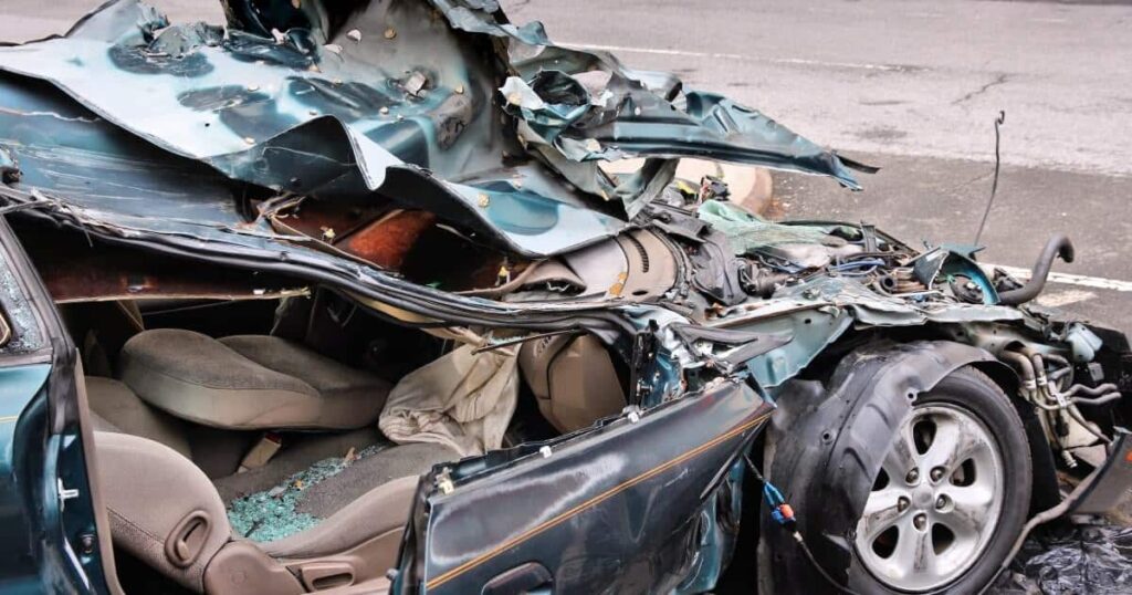 A close-up of a totaled car